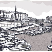 un port de plaisance avec des bateaux et des maisons