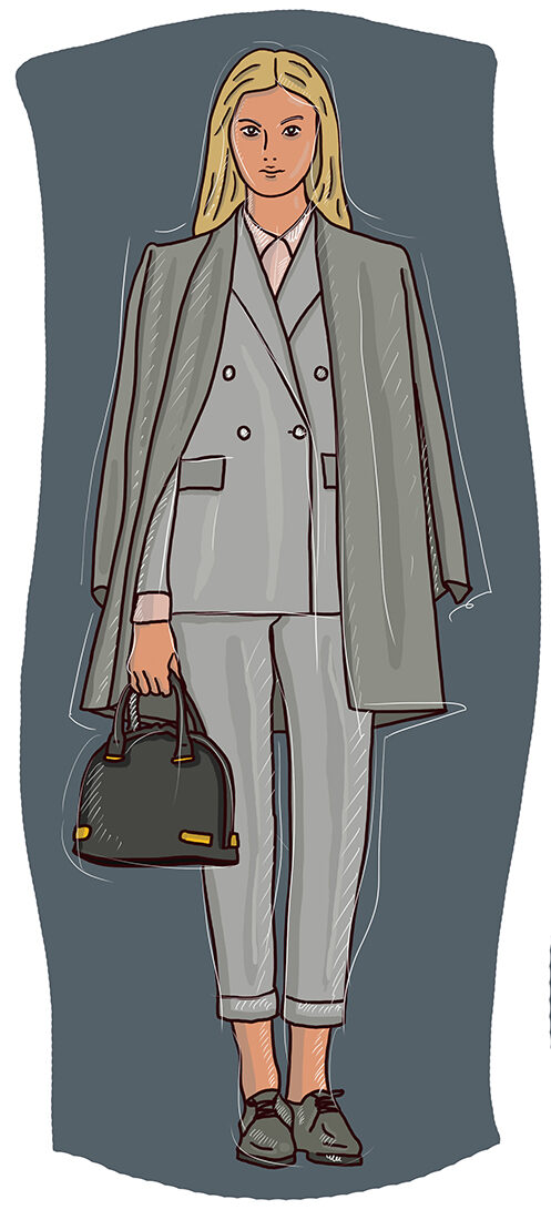 Blondine en costume gris